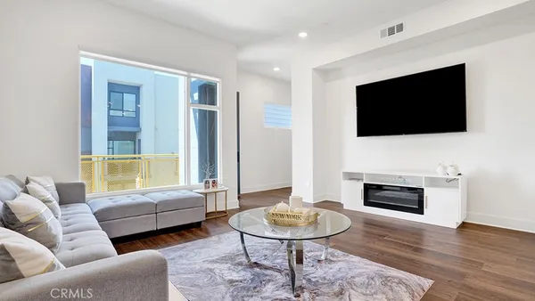 a kitchen with a sink stove and refrigerator