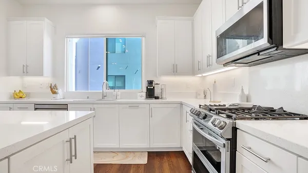 a view of bathroom with dual sinks
