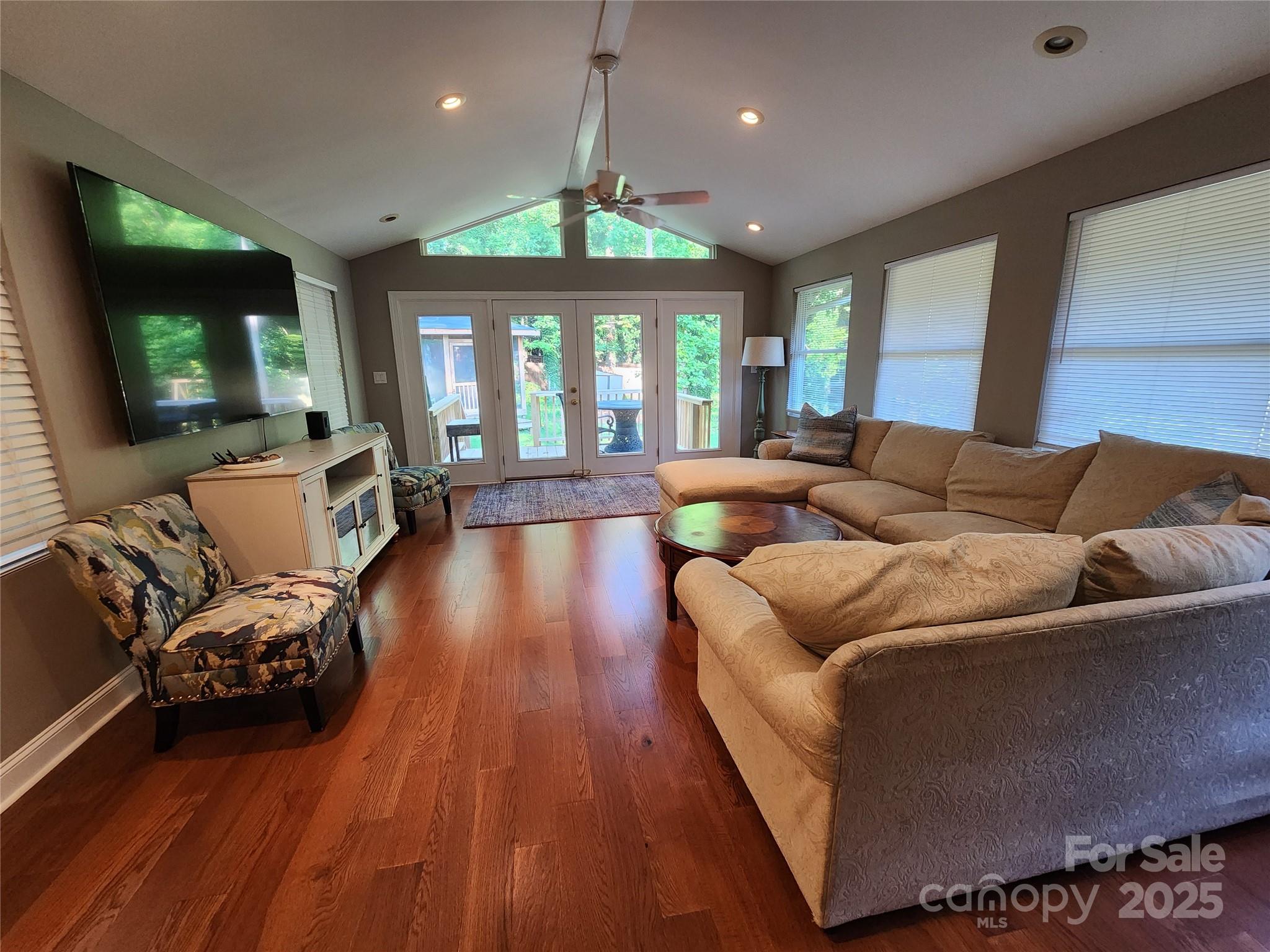 148 Palaside Drive Northeast Concord, NC 28025 - Photo 14 of 17 a living room with furniture and a flat screen tv