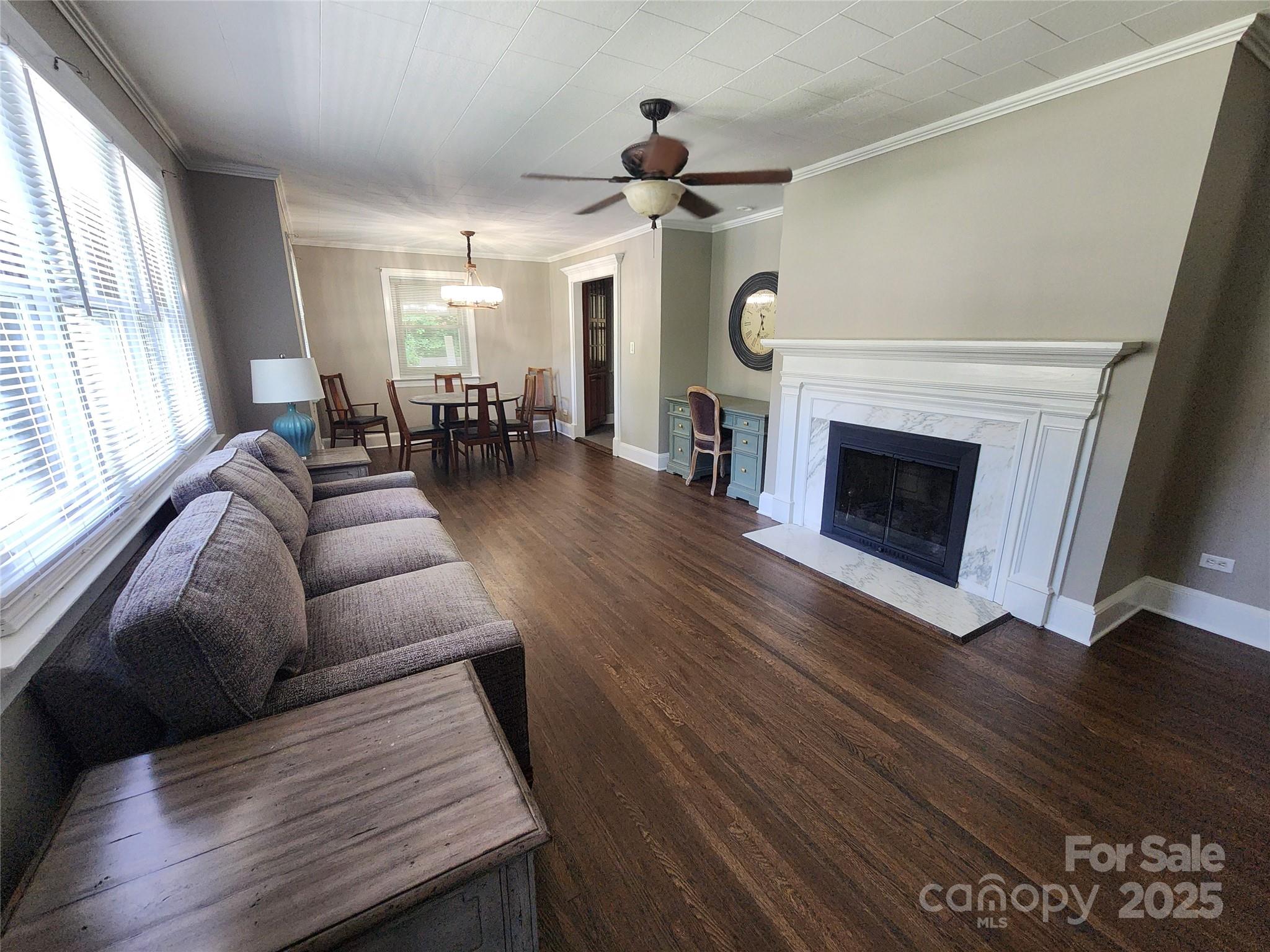 148 Palaside Drive Northeast Concord, NC 28025 - Photo 2 of 17 a living room with furniture and a fireplace