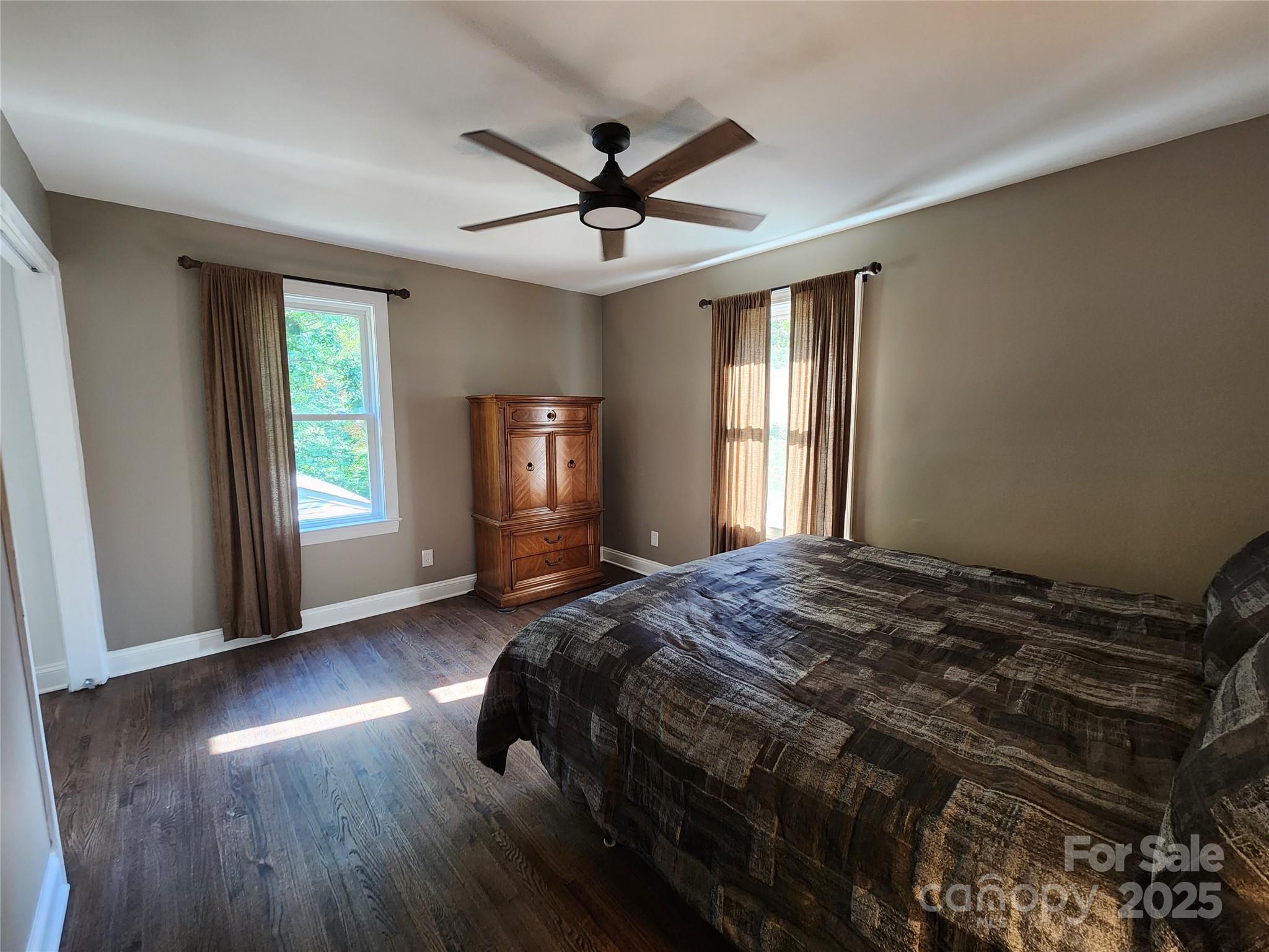 148 Palaside Drive Northeast Concord, NC 28025 - Photo 7 of 17 a bed sitting in a spacious bedroom next to a window
