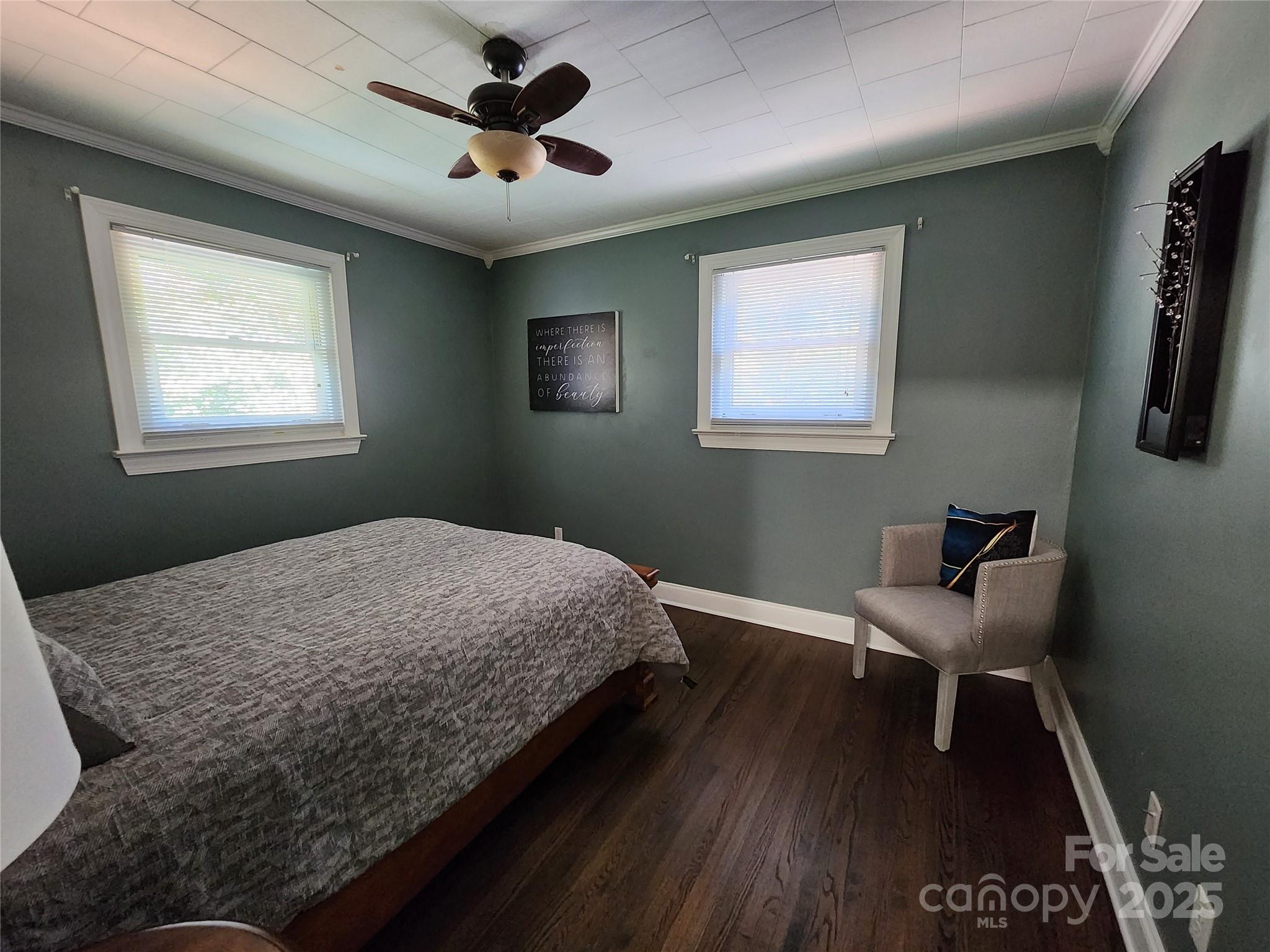 148 Palaside Drive Northeast Concord, NC 28025 - Photo 10 of 17 a bedroom with a bed and a chair