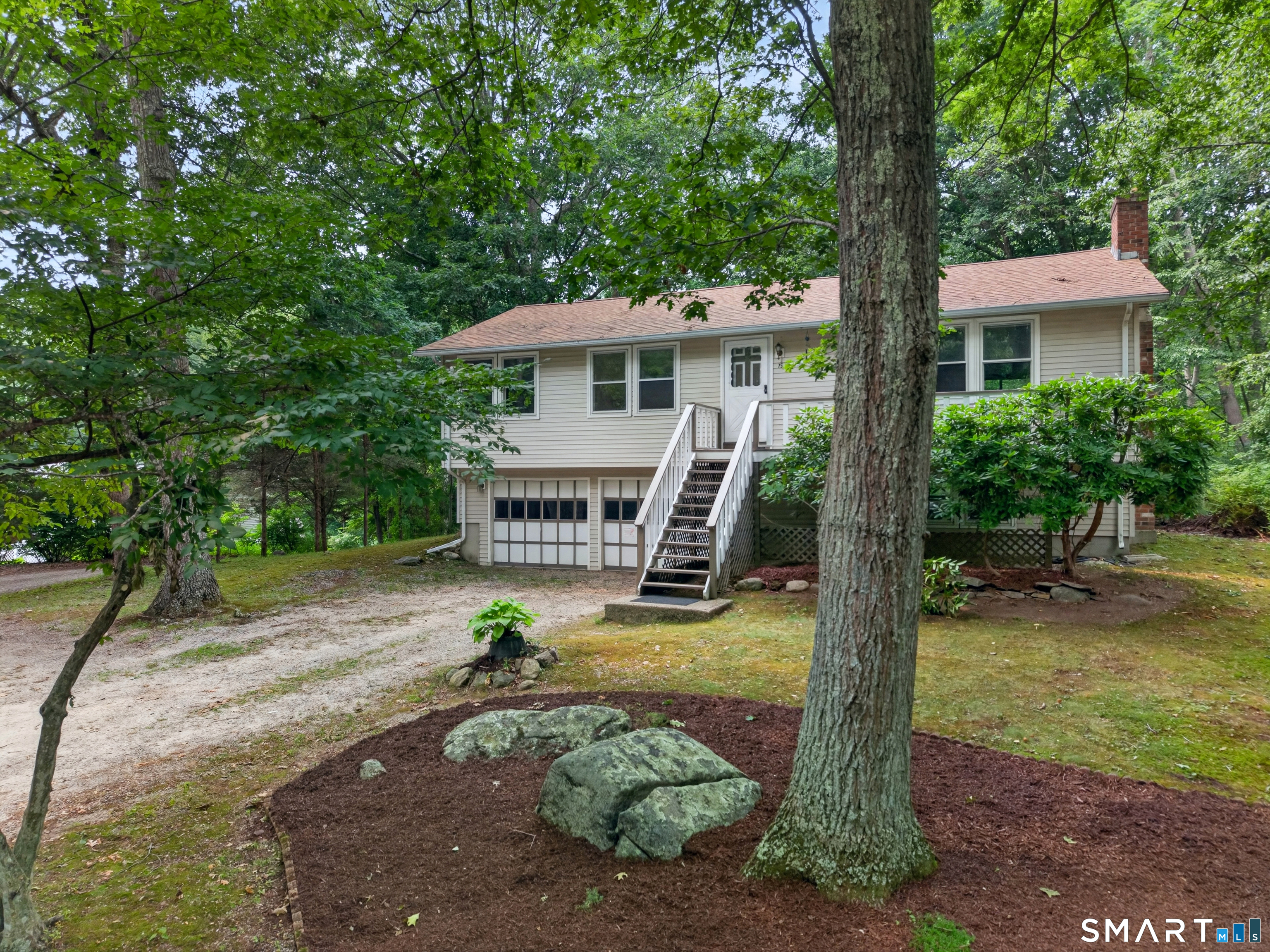 75 Airline Road Clinton, CT 06413 - Photo 37 of 37 a view of a house with backyard and a tree