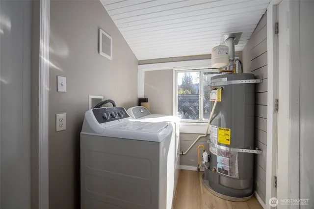 a utility room with dryer and washer
