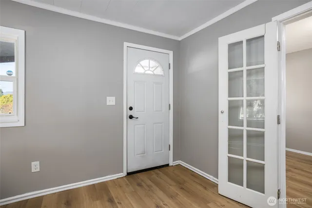 an empty room with windows