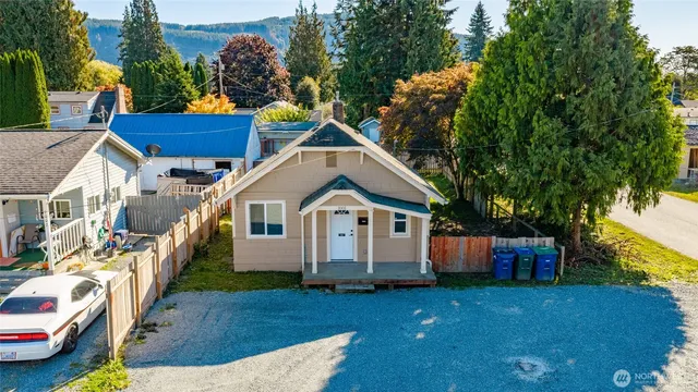 a house view with a garden space
