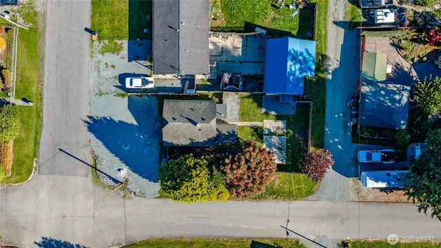 front view of a house with a fountain