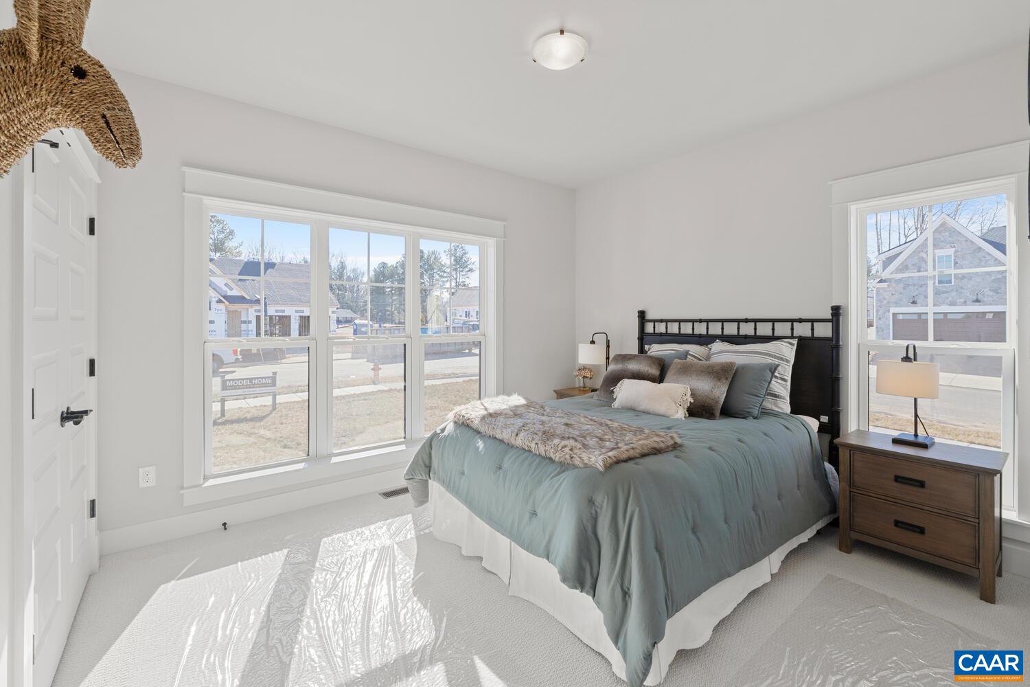 2 Agatha Ridge Lane, Unit C Crozet, VA 22932 - Photo 11 of 42 a bedroom with a bed and large window