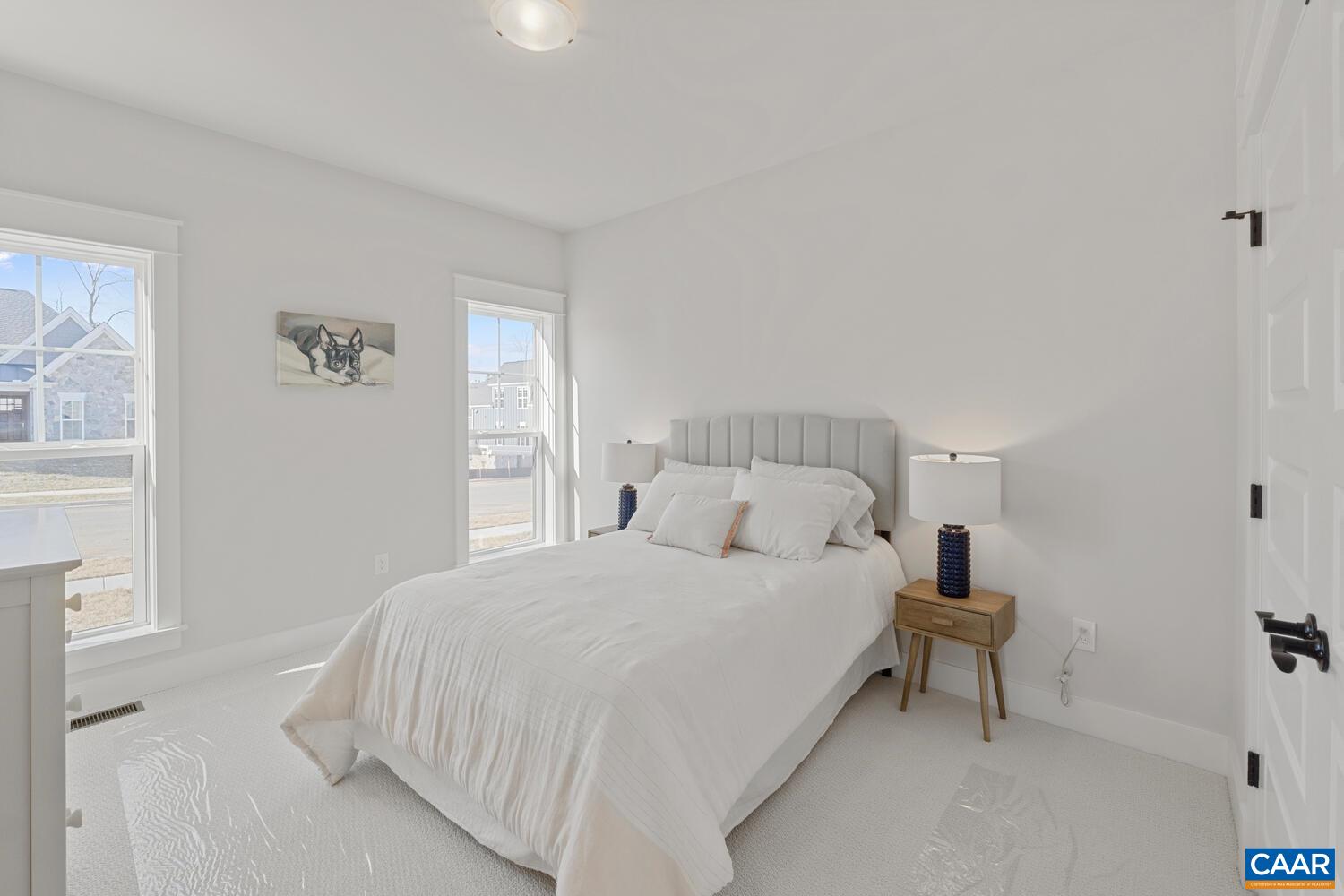 2 Agatha Ridge Lane, Unit C Crozet, VA 22932 - Photo 13 of 42 a bedroom with a bed and a window