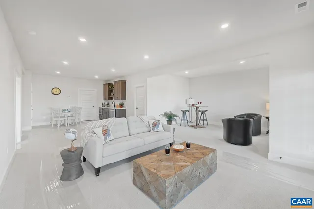 a living room with furniture and a couch