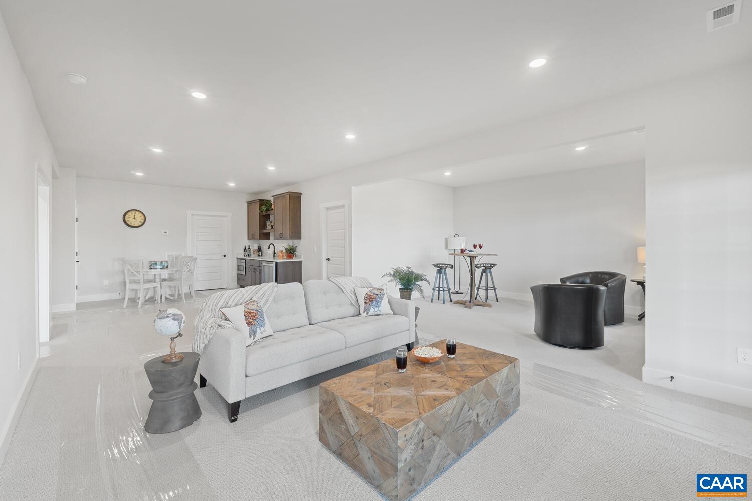 2 Agatha Ridge Lane, Unit C Crozet, VA 22932 - Photo 32 of 42 a living room with furniture and a couch