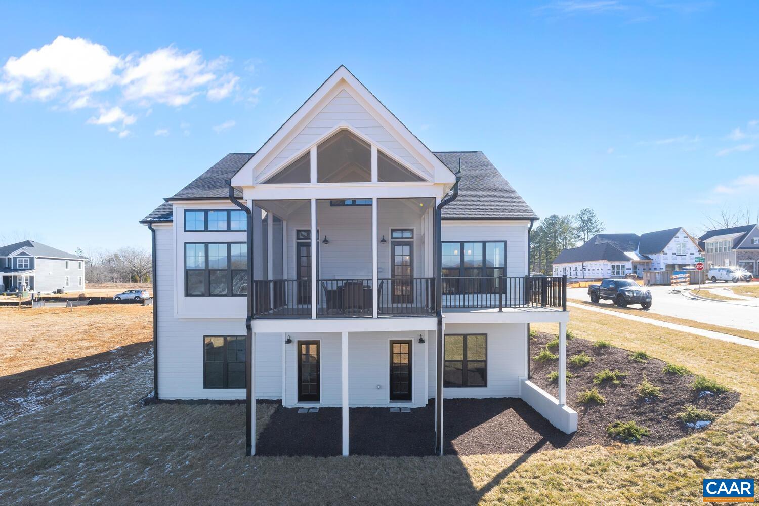 2 Agatha Ridge Lane, Unit C Crozet, VA 22932 - Photo 6 of 42 a front view of a house with a yard