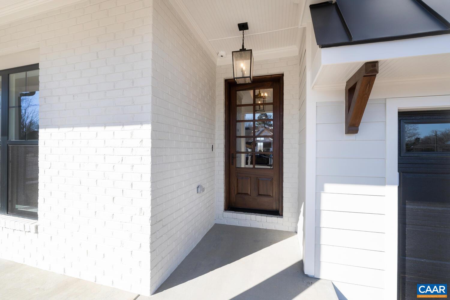2 Agatha Ridge Lane, Unit C Crozet, VA 22932 - Photo 7 of 42 a view of hallway with stairs and wooden floor