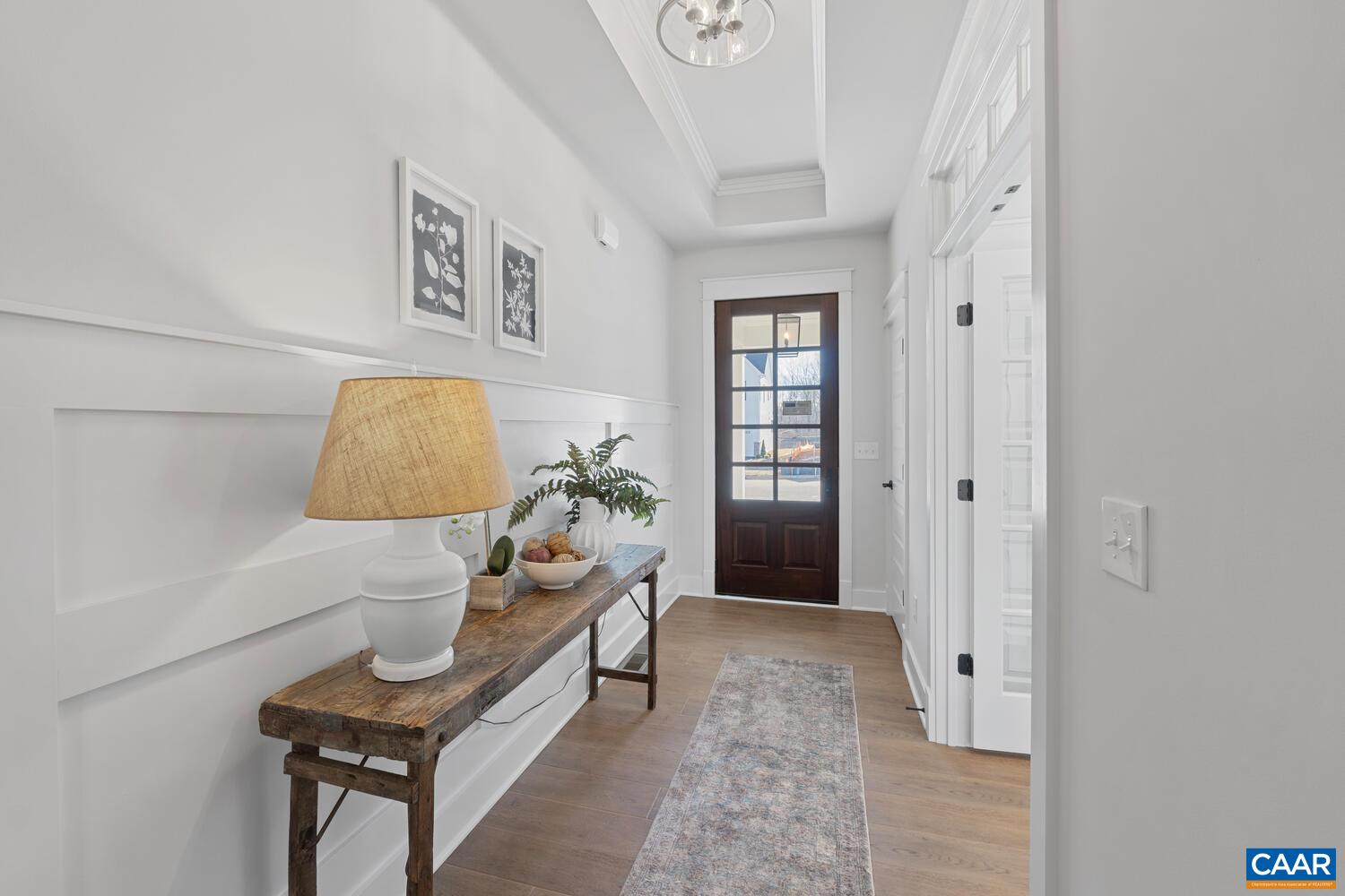 2 Agatha Ridge Lane, Unit C Crozet, VA 22932 - Photo 8 of 42 a living room with furniture and a painting on the wall