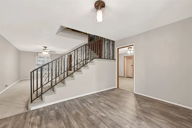 a view of entryway with wooden floor