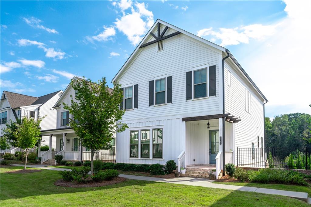 front view of a house with a yard