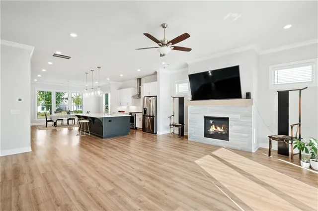 a view of kitchen with sink and wooden floor