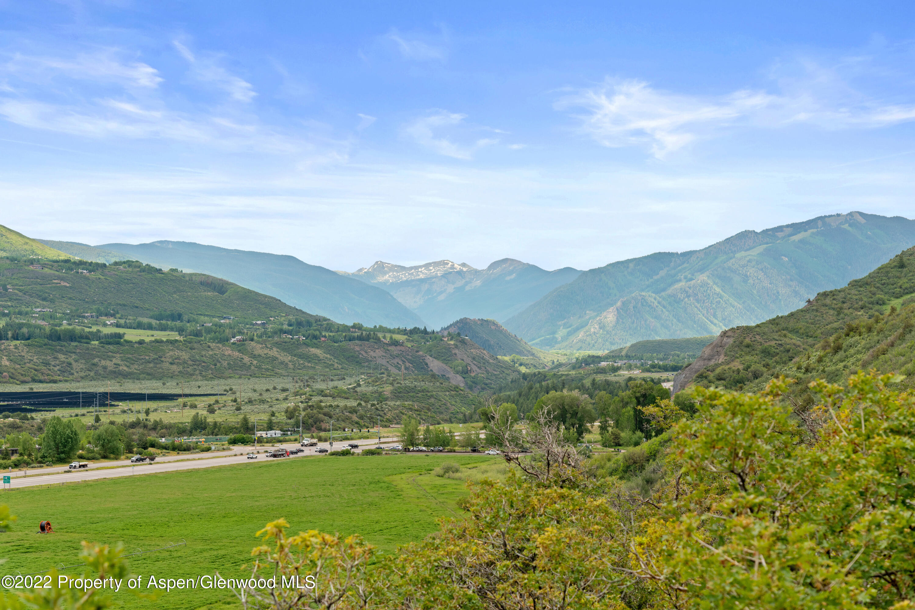 540 Upper Ranch Road Aspen, CO 81611 - Photo 21 of 24 a view of a mountain with a garden