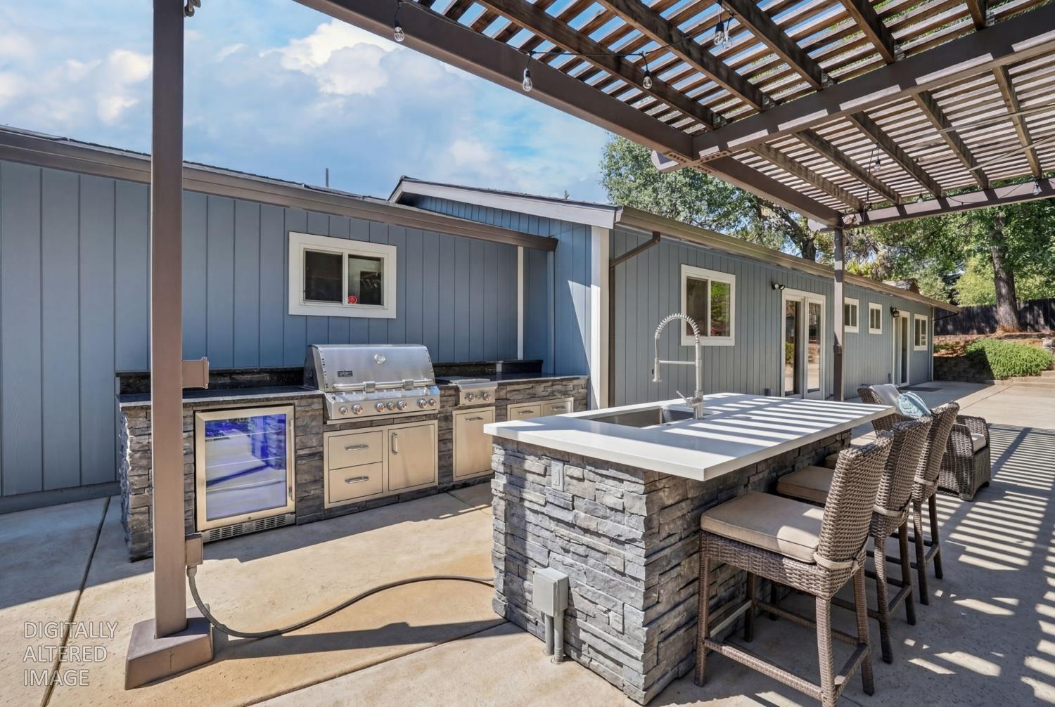 2609 Hastings Drive Rescue, CA 95672 - Photo 83 of 87 Outdoor kitchen virtually added. Home is plumbed for kitchen but NO OUTDOOR kitchen currently