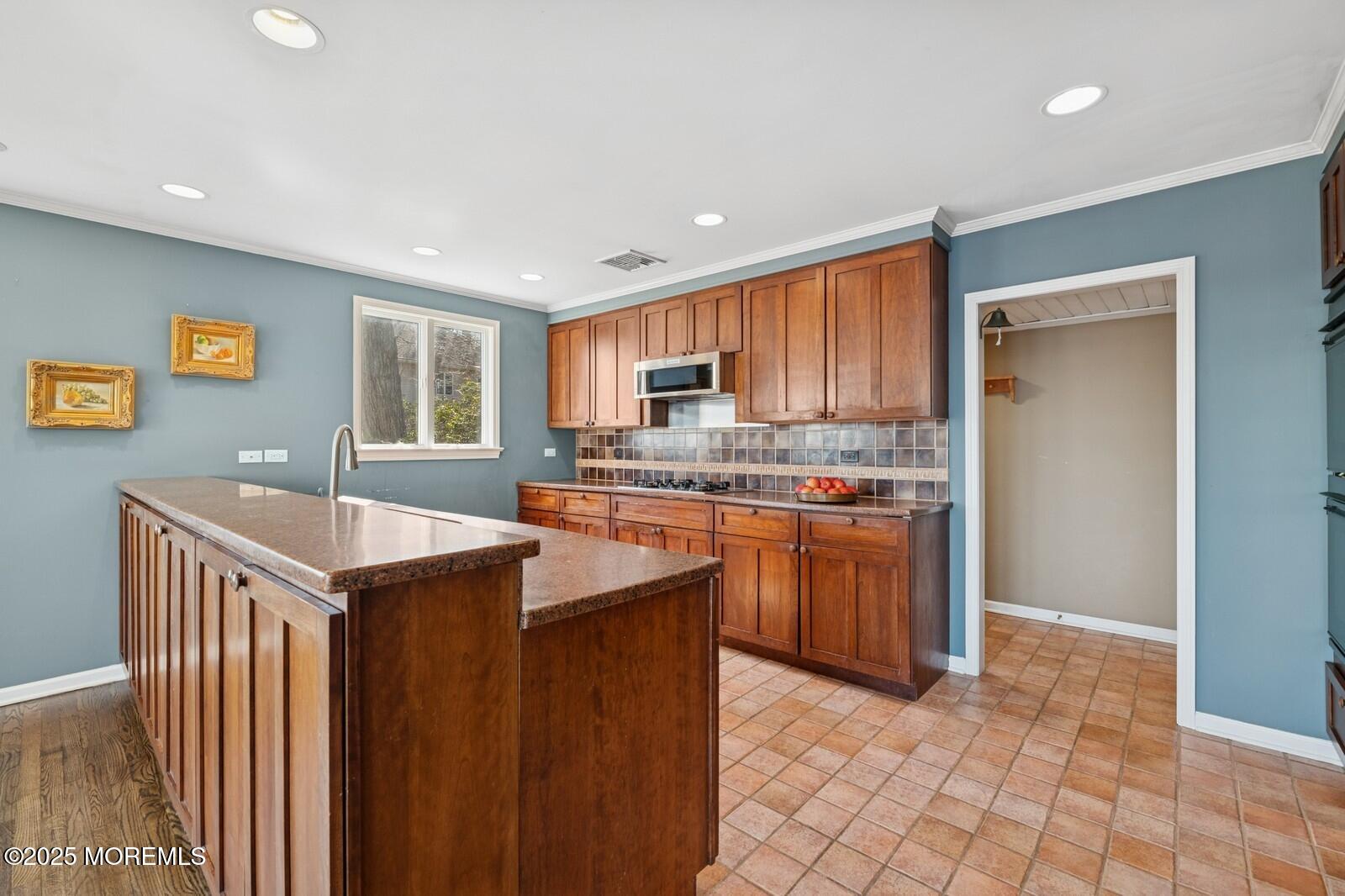 6 Hillside Road Atlantic Highlands, NJ 07716 - Photo 8 of 57 a kitchen with granite countertop a stove top oven a sink dishwasher and a refrigerator