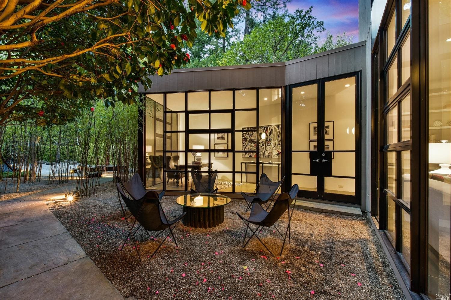 59 Madrone Avenue Larkspur, CA 94939 - Photo 1 of 1 a view of a porch with chairs and backyard