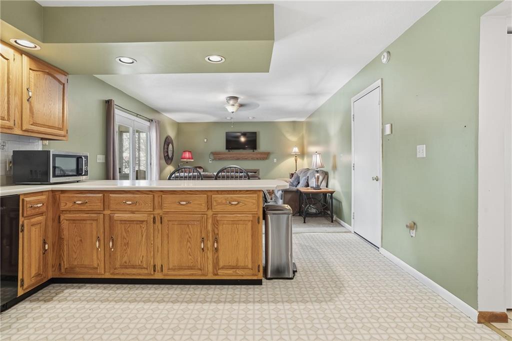202 Holyoke Road Butler, PA 16001 - Photo 12 of 49 a spacious bathroom with a granite countertop sink mirror and bathtub