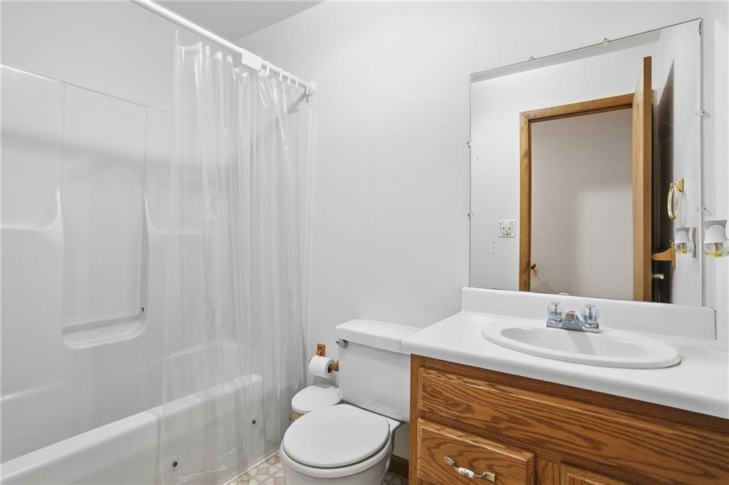 202 Holyoke Road Butler, PA 16001 - Photo 24 of 49 a bathroom with a granite countertop sink toilet and shower