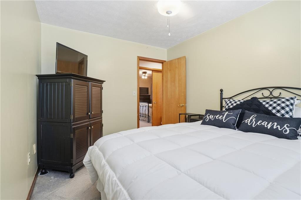 202 Holyoke Road Butler, PA 16001 - Photo 25 of 49 a bedroom with a bed and cabinets