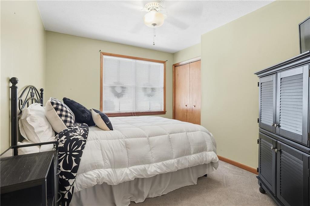 202 Holyoke Road Butler, PA 16001 - Photo 26 of 49 a bedroom with a bed and a dresser