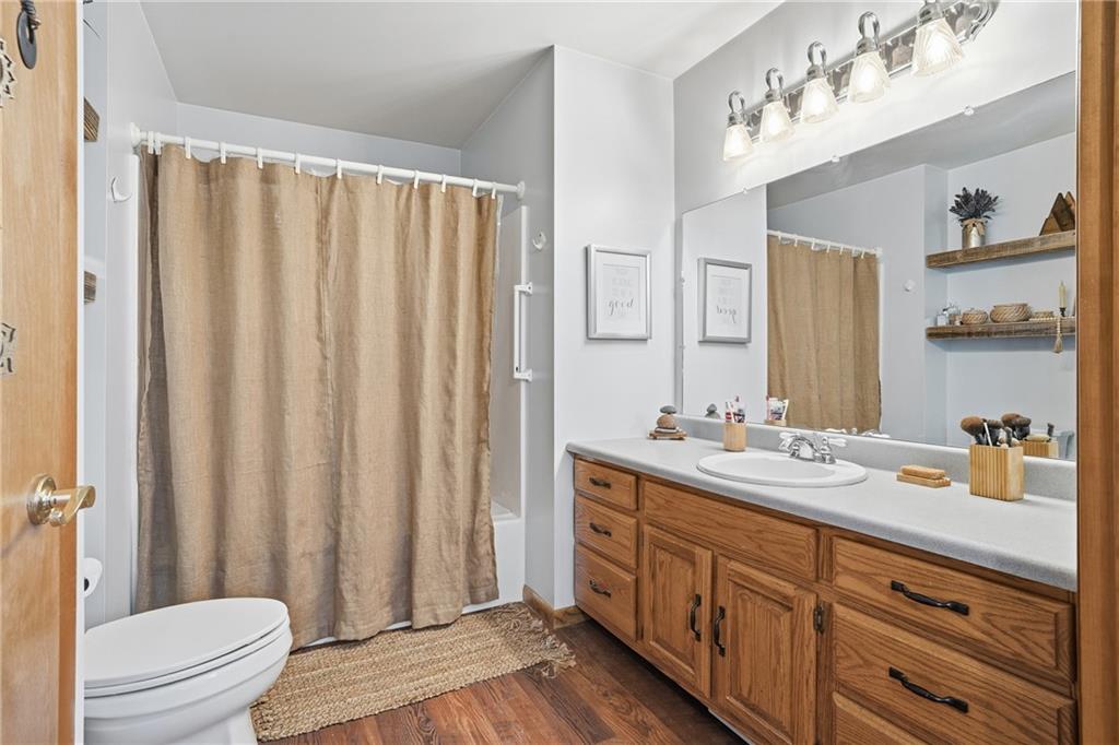 202 Holyoke Road Butler, PA 16001 - Photo 31 of 49 a bathroom with a double vanity sink toilet and shower
