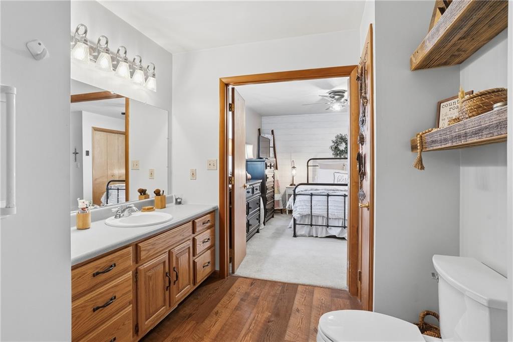 202 Holyoke Road Butler, PA 16001 - Photo 33 of 49 a bathroom with a sink vanity mirror and toilet