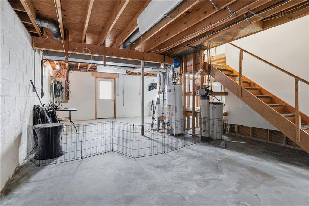202 Holyoke Road Butler, PA 16001 - Photo 36 of 49 a view of an empty room with stairs