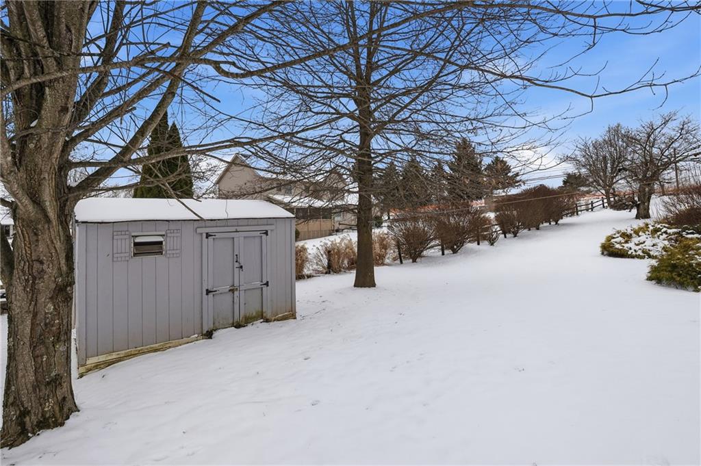 202 Holyoke Road Butler, PA 16001 - Photo 46 of 49 a view of a house with a snow in the yard