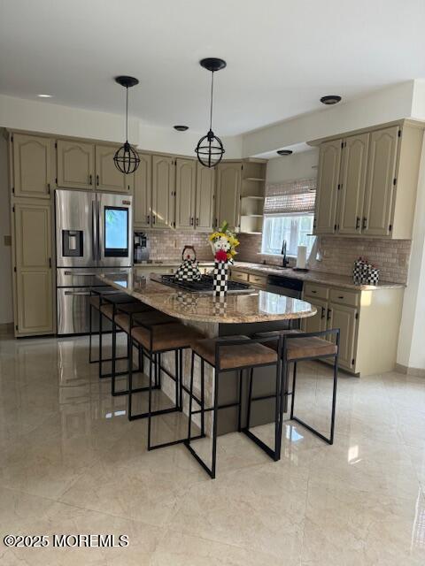 4 Coral Drive Howell, NJ 07731 - Photo 13 of 47 a kitchen with stainless steel appliances kitchen island granite countertop a table chairs sink and cabinets