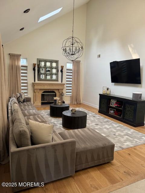 4 Coral Drive Howell, NJ 07731 - Photo 16 of 47 a living room with furniture a flat screen tv and a fireplace