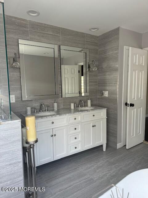 4 Coral Drive Howell, NJ 07731 - Photo 23 of 47 a bathroom with a granite countertop sink mirror and vanity