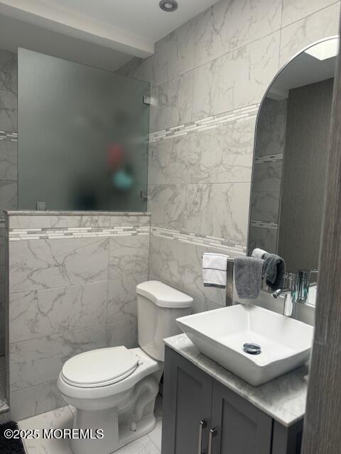 4 Coral Drive Howell, NJ 07731 - Photo 34 of 47 a bathroom with a sink a toilet and a mirror