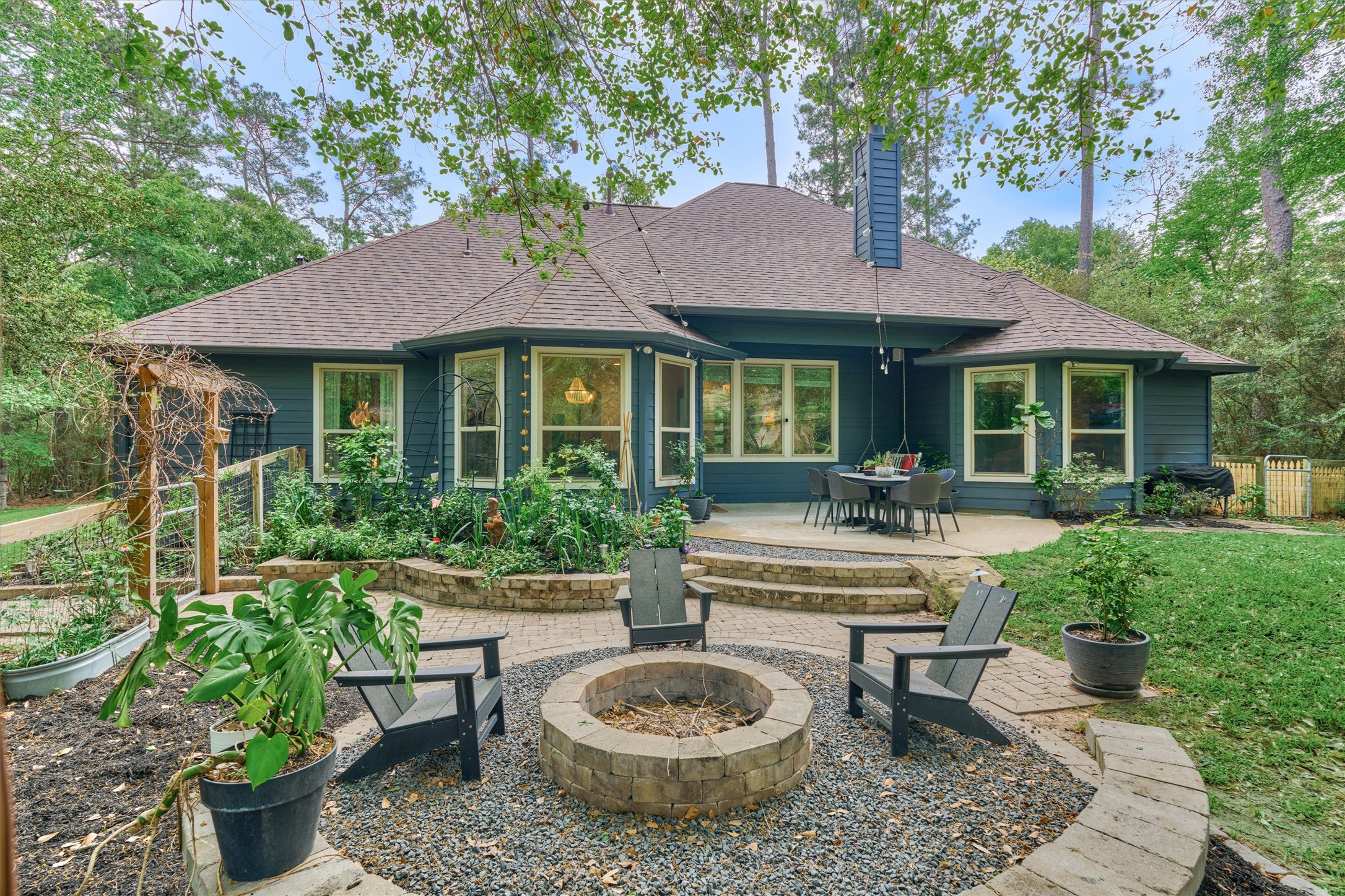 16727 Boothill Road Stagecoach, TX 77355 - Photo 2 of 44 Enjoy the firepit with family and friends.