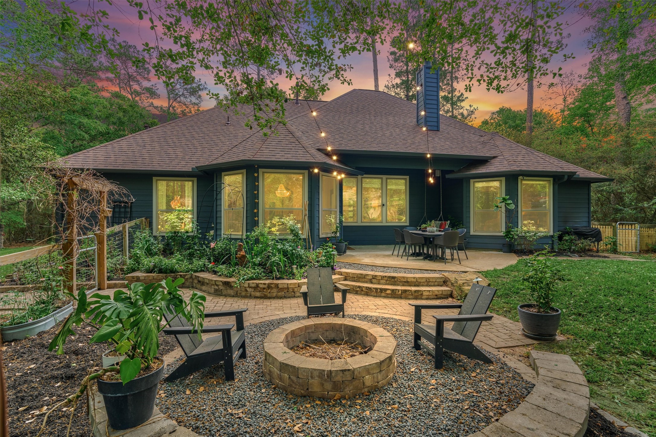 16727 Boothill Road Stagecoach, TX 77355 - Photo 2 of 44 Enjoy the firepit with family and friends.