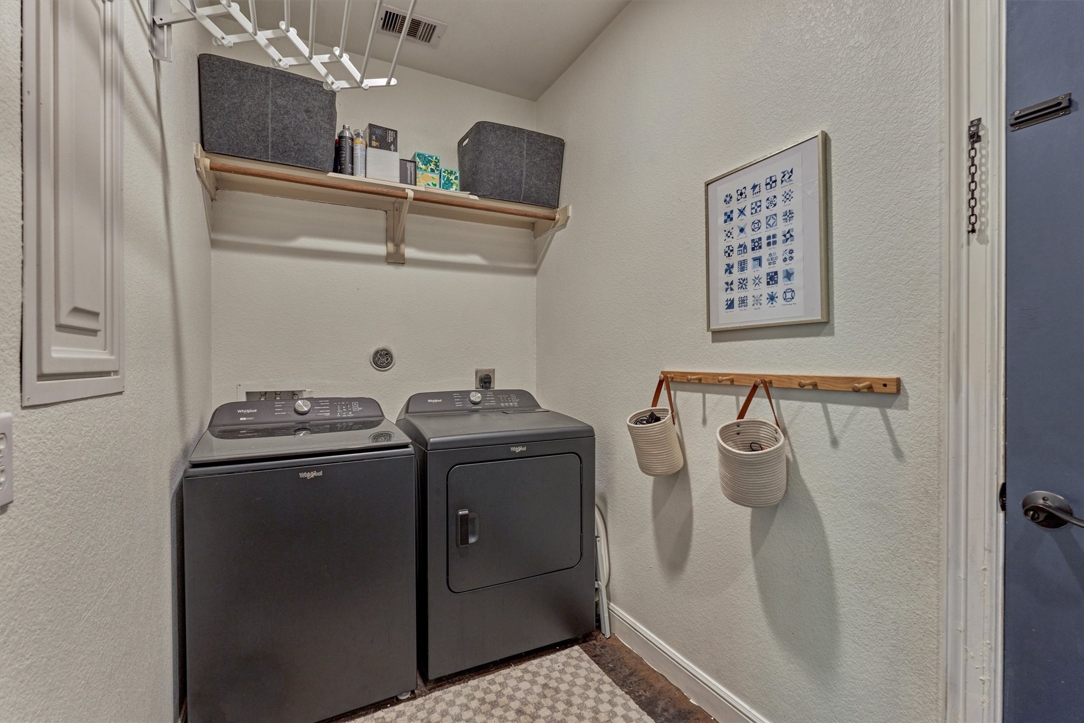 16727 Boothill Road Stagecoach, TX 77355 - Photo 27 of 44 Utility room offers storage space.