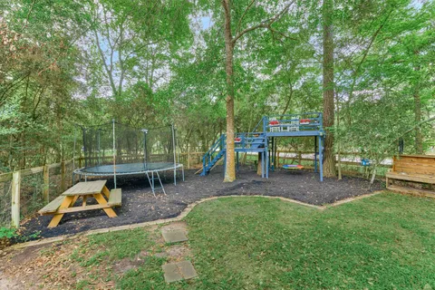 a view of a house with backyard porch and patio