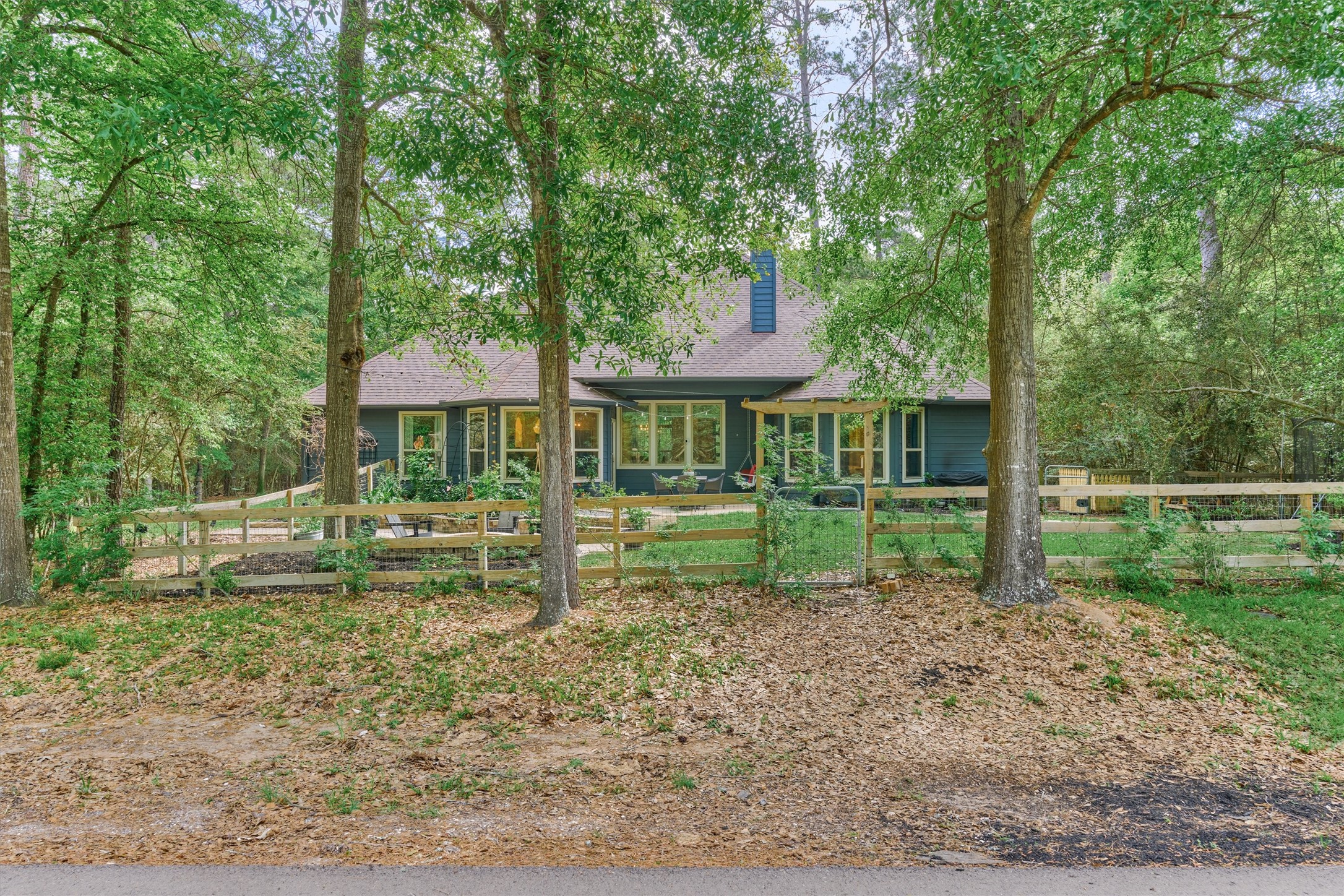 16727 Boothill Road Stagecoach, TX 77355 - Photo 33 of 44 Fully fenced backyard - for added peace of mind.