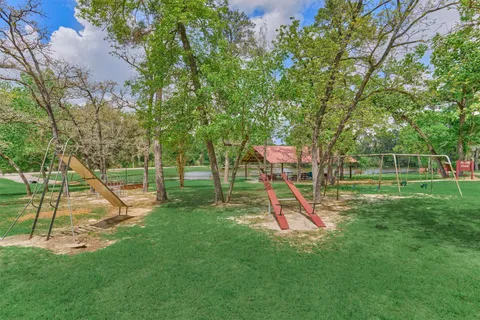 a view of a park with swings