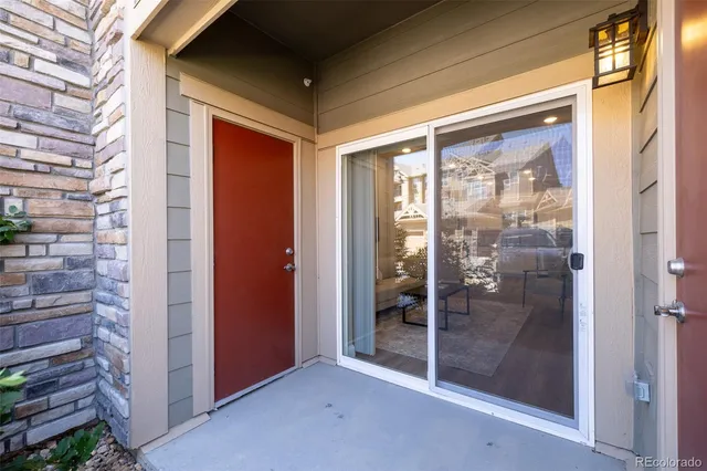 a kitchen with stainless steel appliances granite countertop a refrigerator and microwave