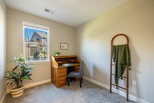 a view of a hallway with washer and dryer