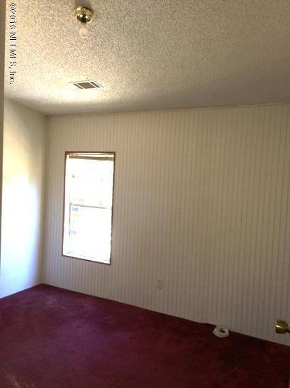 13126 Pate Road West Jacksonville, FL 32226 - Photo 14 of 14 an empty room with a window