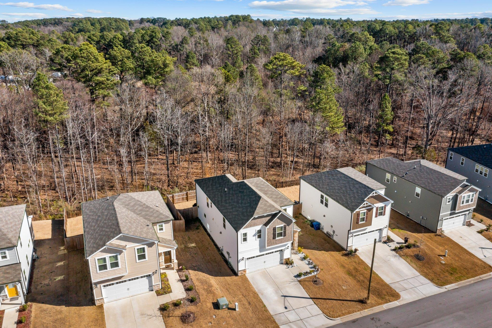 1405 Wrenn Road Durham, NC 27703 - Photo 4 of 28 House and wooded area beyond back yard.