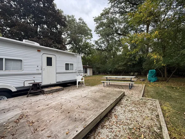 a house view with a backyard space
