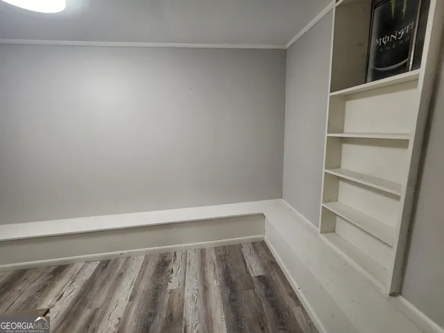 a view of an empty walk in closet