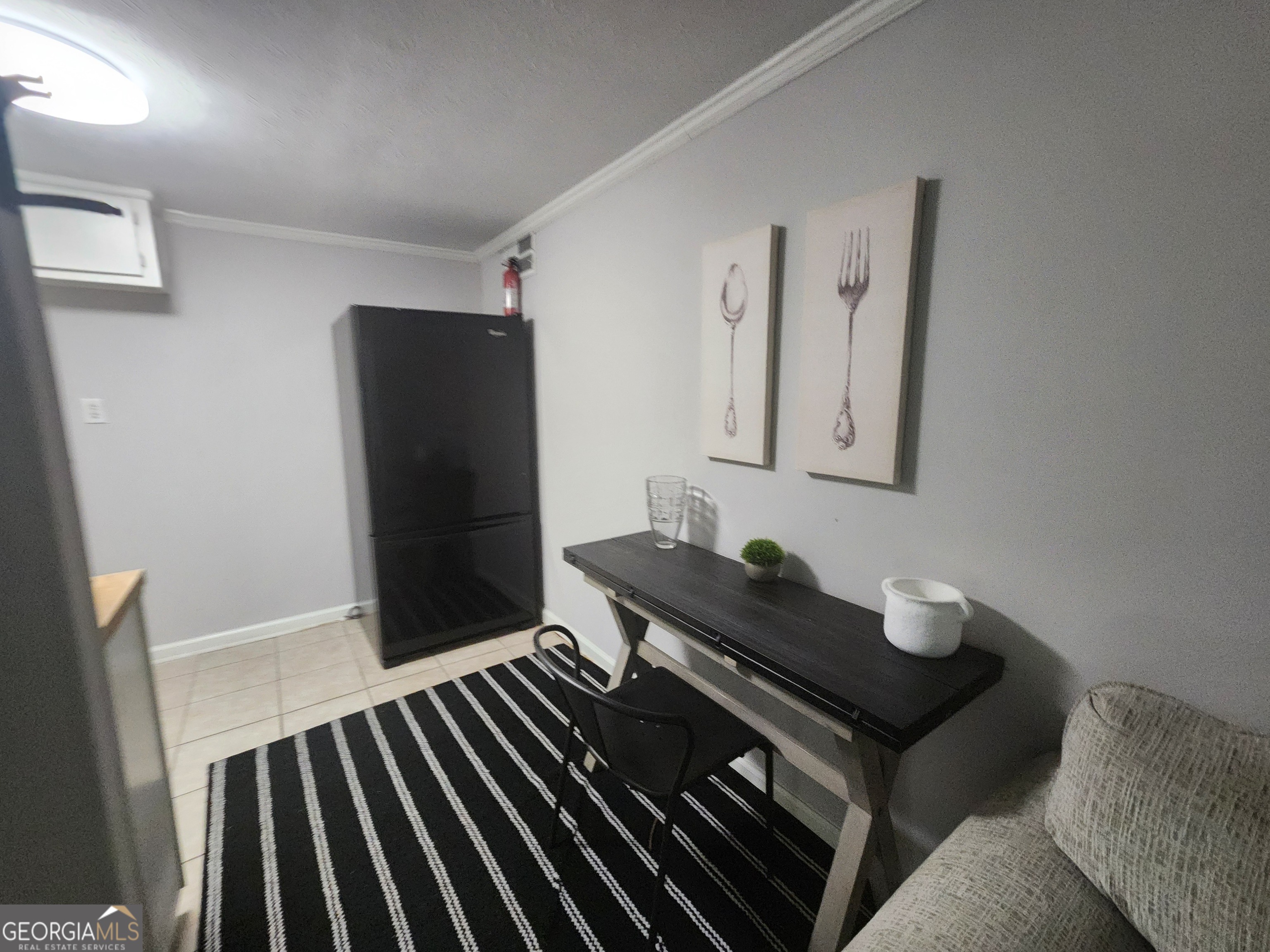 917 Oakview Avenue, Unit E Columbus, GA 31906 - Photo 3 of 13 a bathroom with a sink and a mirror